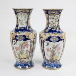 Pair 19th century Japanese vases with floral motifs on cobalt blue and white background