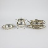 A silver bottle coaster Delheid 800, a French sugar bowl and silvered sauce bowl Minerve French silv