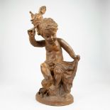 Terracotta Playing child with hand puppet, signed