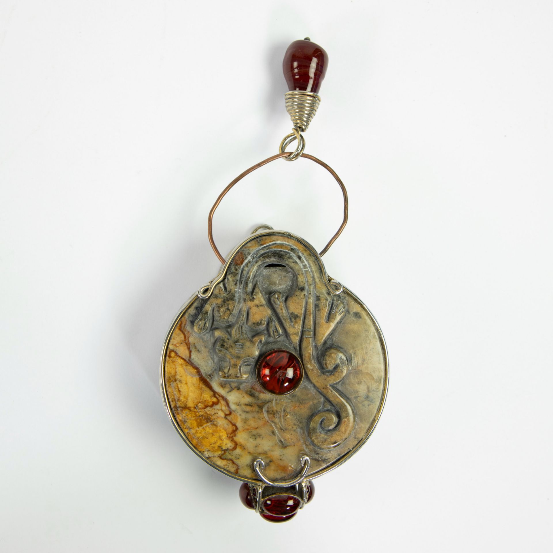 Steel bag with Iradj Moini jewelry, russet jade and glass