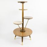 A stylish mid century plant stand by Ilse Möbel circa 1950, with formica tops