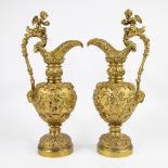Pair bronze gold-plated pitchers decorated with putti