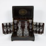 Cave a liquer Napoleon III with copper inlay, 4 engraved decanters and 16 glasses