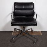 Design/vintage office chair leather and chrome base on wheels