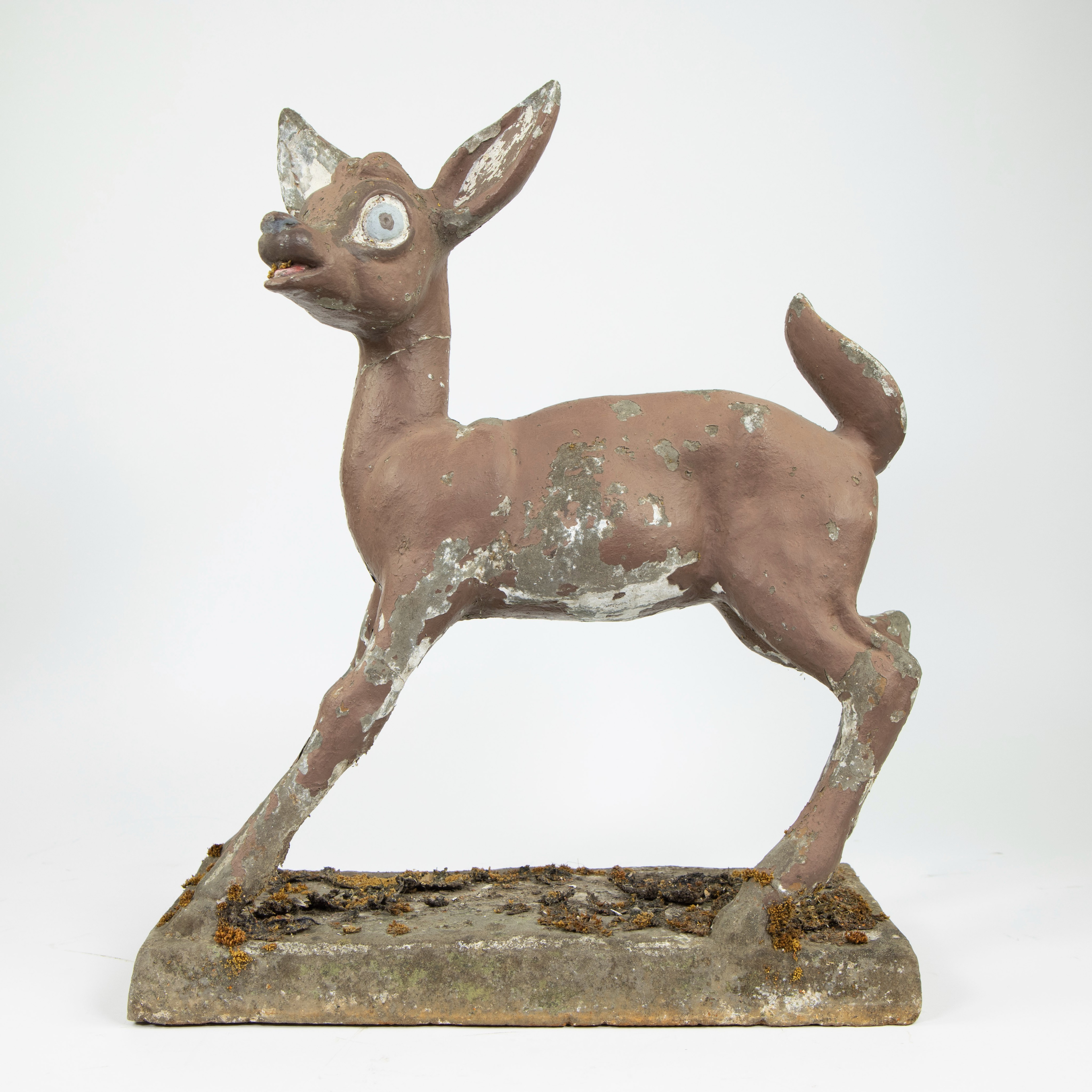 Vintage patinated stone sculpture of a deer cub