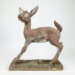 Vintage patinated stone sculpture of a deer cub