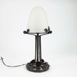 Art Deco lamp with wrought iron base and glass paste shade