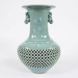 Korean celadon vase with openwork exterior and decoration of flying cranes on the neck