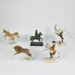 A collection of 4 figurines of horses Hutschenreuter and Augarten Wien and one bronze Napoleon