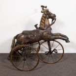 Antique tricycle with rocking horse