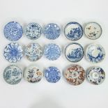 A collection of 15 Chinese saucers blue/white an Imari