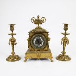 French bronze clock marked H.Luppens (Paris) with candlesticks
