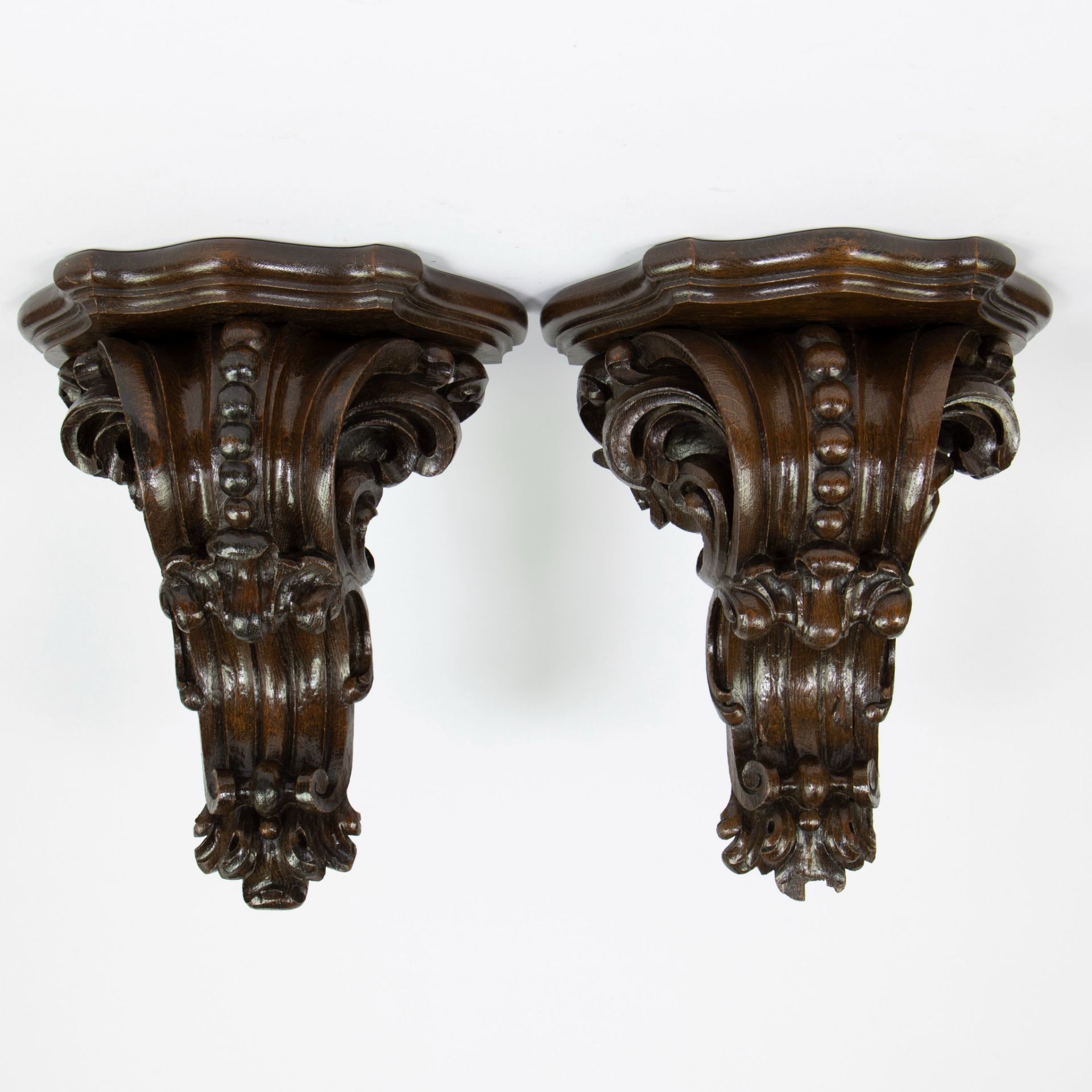 Pair of antique oak consoles