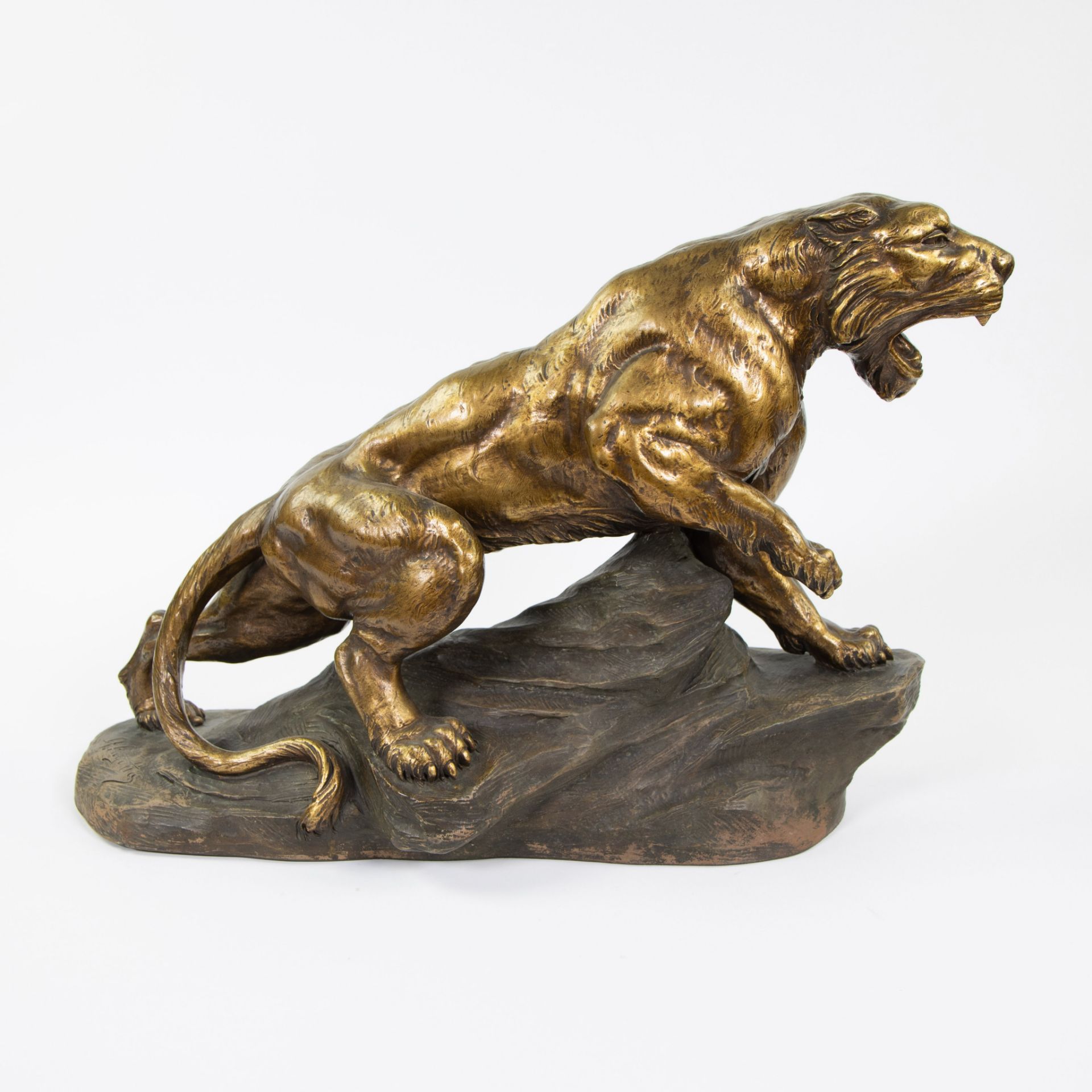 Armand FAGOTTO, gilt patinated terracotta of a panther on a rock, circa 1940, signed. - Image 2 of 5