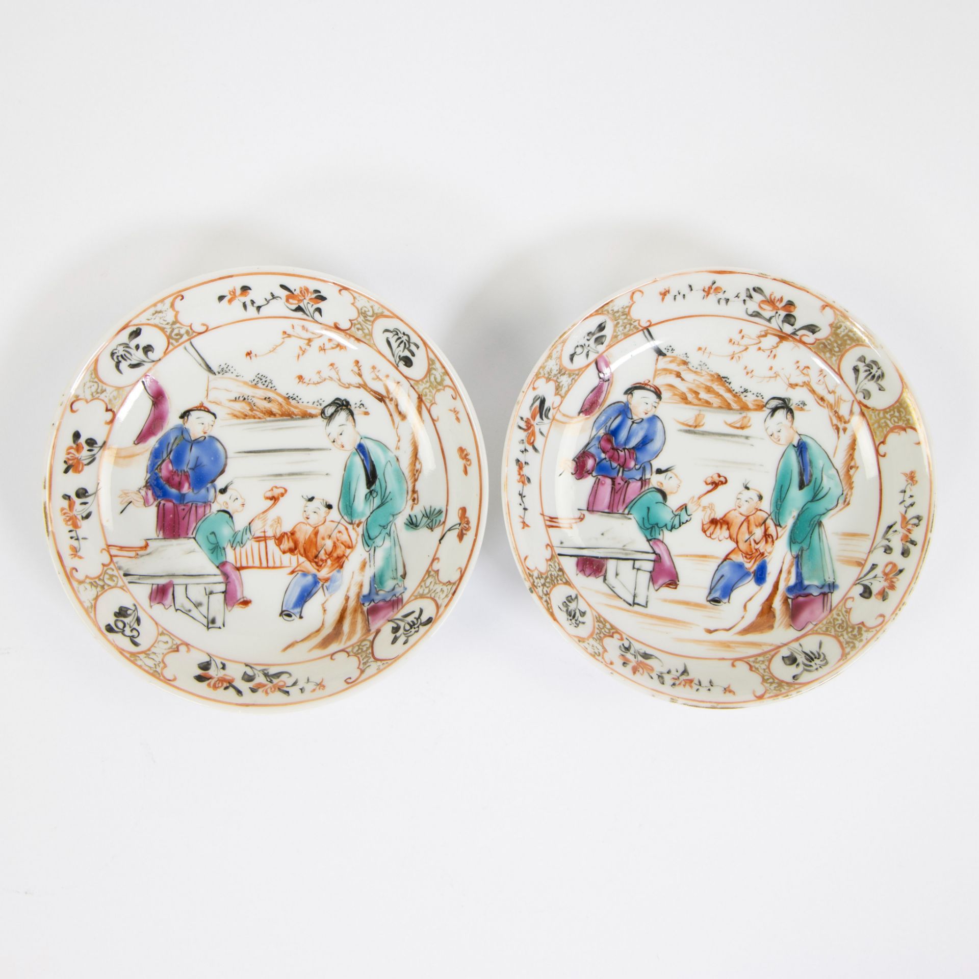 China, a pair of famille rose porcelain plates and cups with Mandarin decor, Qianlong - Image 2 of 9