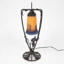 Noverdy table lamp France, wrought iron and glass shade with melted colour powders, signed.