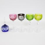Collection of 4 colored crystal glasses and blue crystal bell