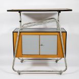 Vintage side table/console with tubular frame on wheels, cabinet with formica and adjustable top in