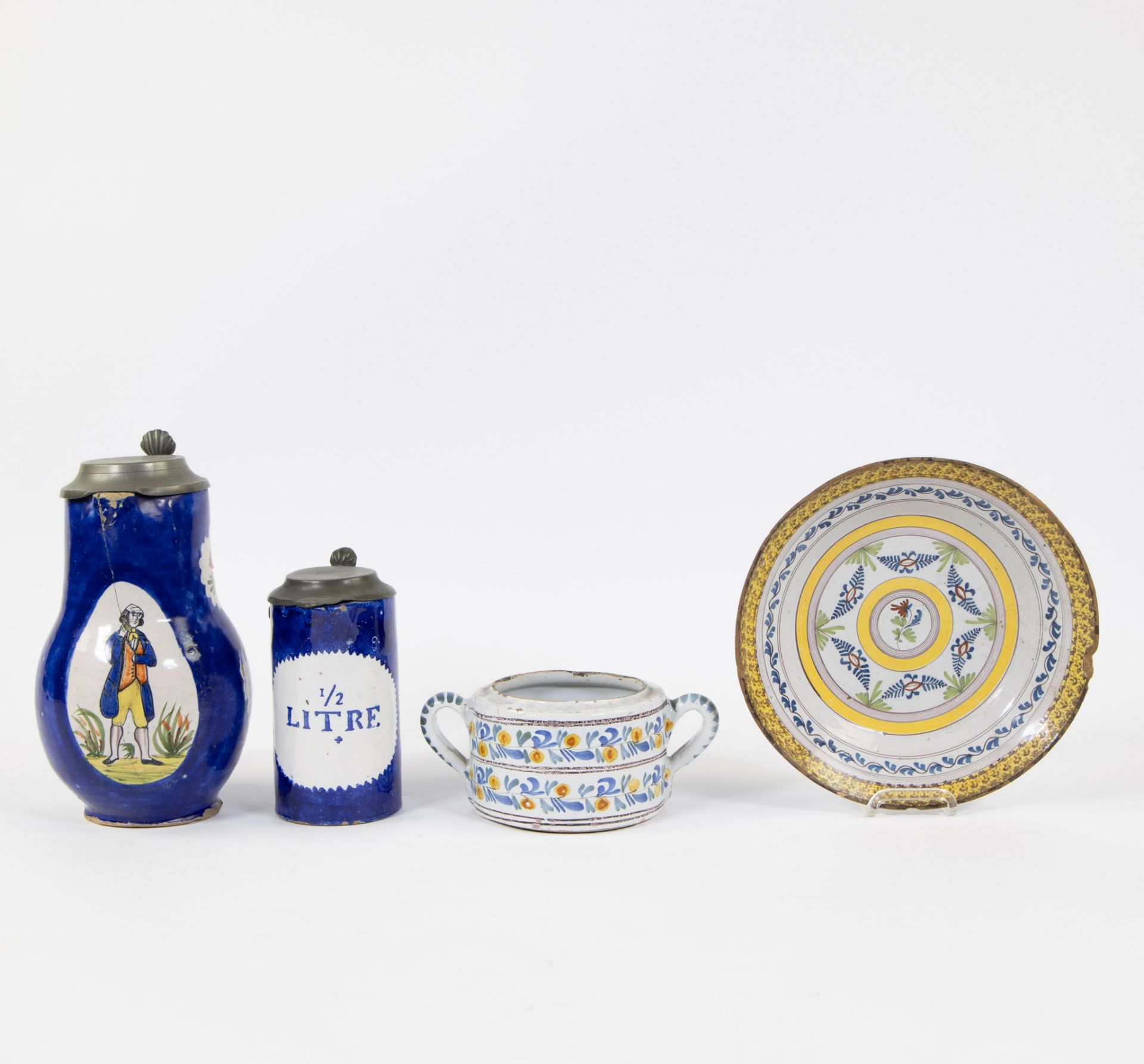 Collection of Brussels faience, 2 jugs, butter pot and plate