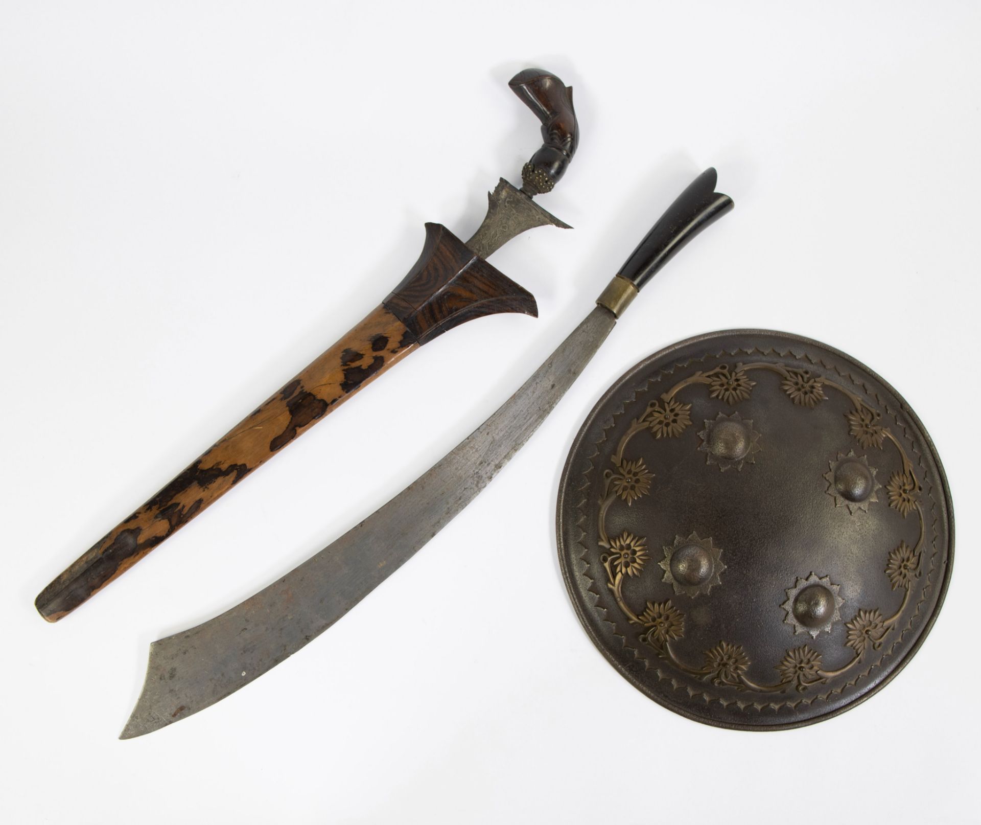 An Indonesian keris, a klewang and a shield