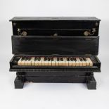 Mini piano with ivory keys and strings on a wooden frame, ca 1880