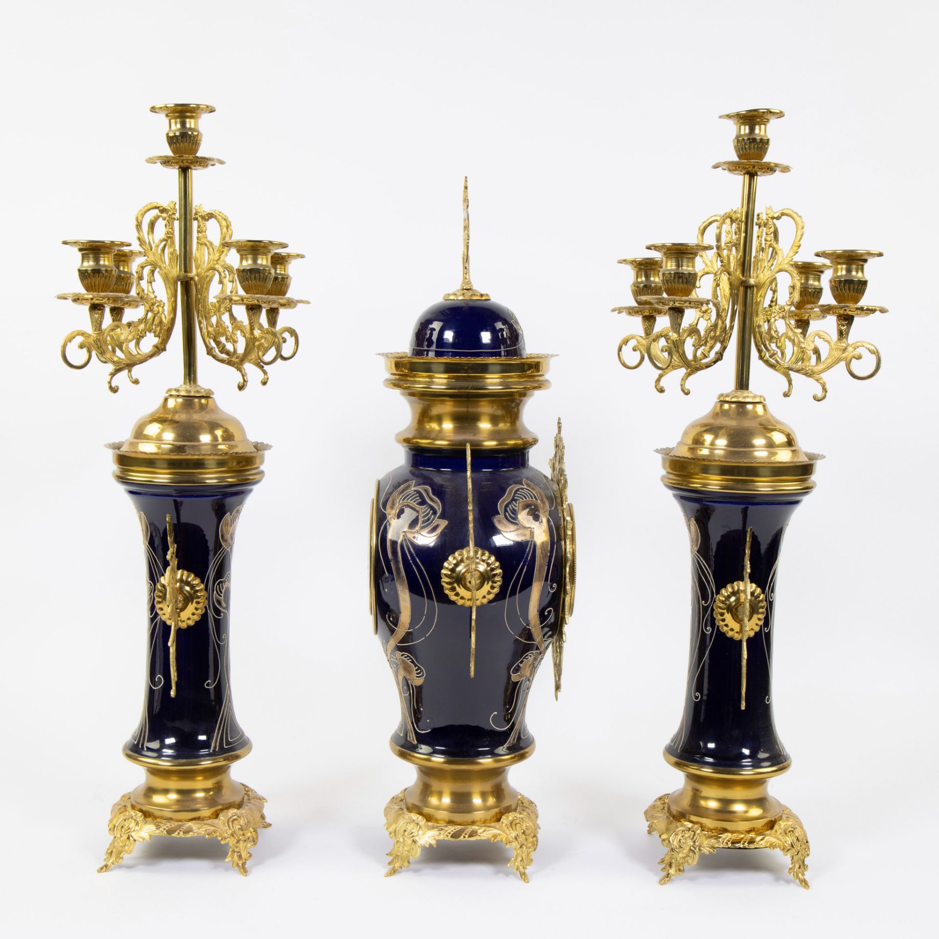 Three piece faience garnish decorated with stylized whiplash motifs and gilt brass, candlesticks wit - Image 4 of 4