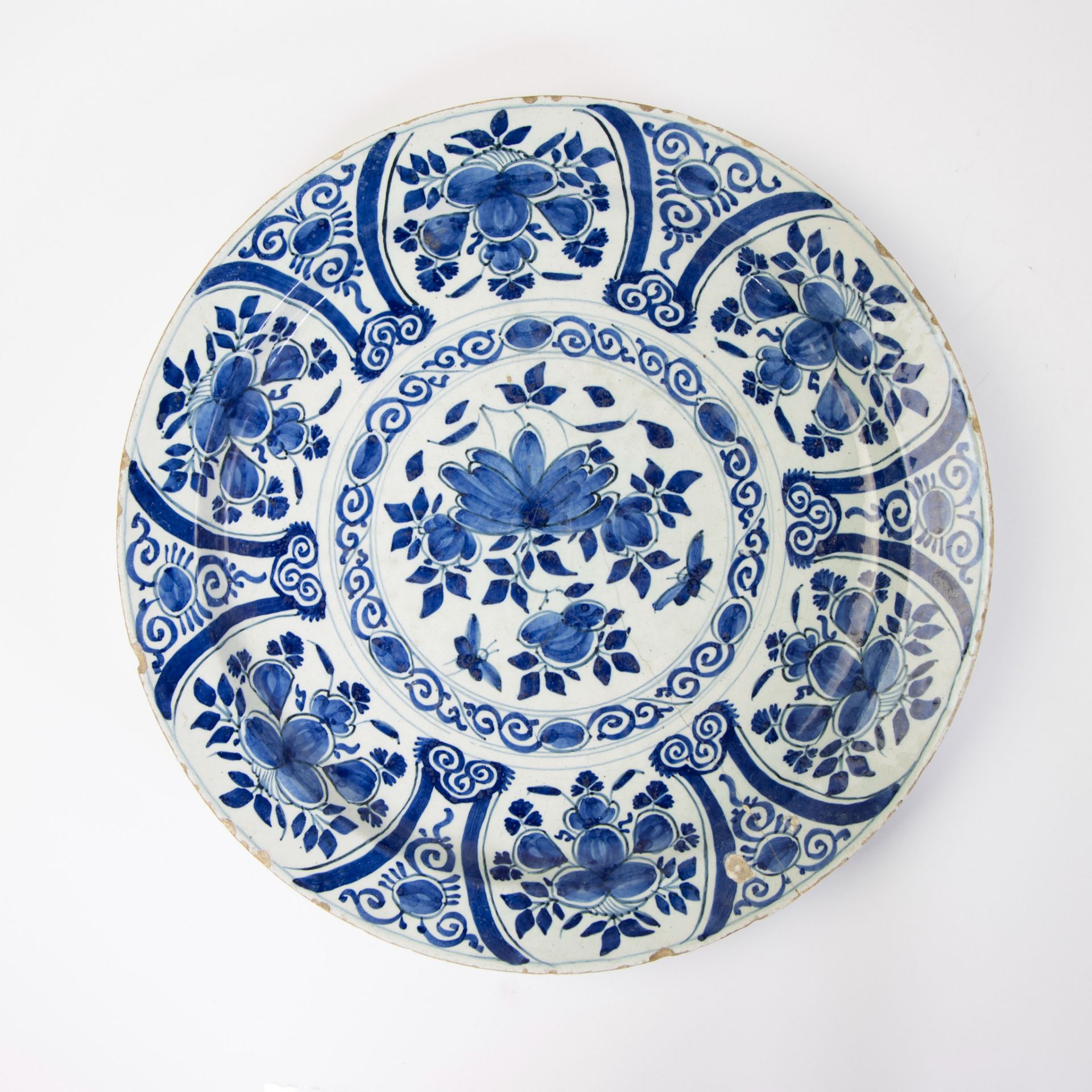 A Delft blue and white gadrooned chinoiserie dish, 17th C and 2 blue and white plates. - Image 4 of 7