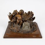 Wooden sculpture of 2 amours and flower with glass inkwell, Austria ca 1900