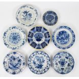 Collection of 8 blue Delft plates, 2 peacock plates and 6 with floral motifs