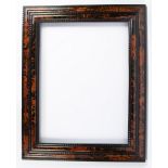 Frame with red tortoiseshell inlaid and ebony rubber moldings.