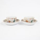 China, a pair of famille rose porcelain plates and cups with Mandarin decor, Qianlong