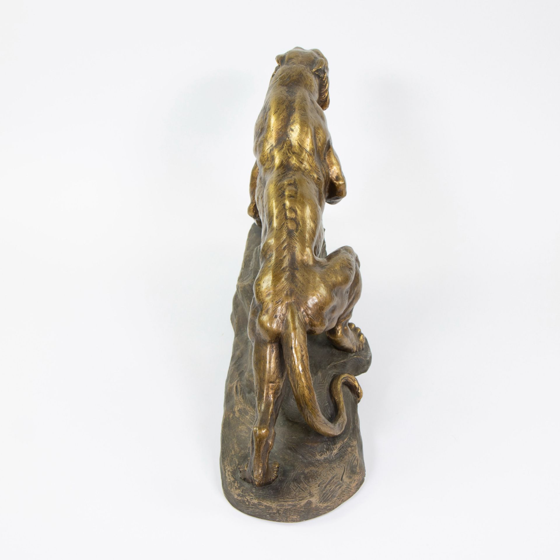 Armand FAGOTTO, gilt patinated terracotta of a panther on a rock, circa 1940, signed. - Image 3 of 5