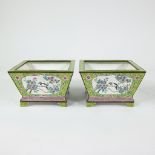 Pair small Chinese planters with birds and floral decor in Canton enamel