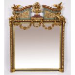 Colored wooden mirror with gilded garlands, birds, cherubs and floral motifs