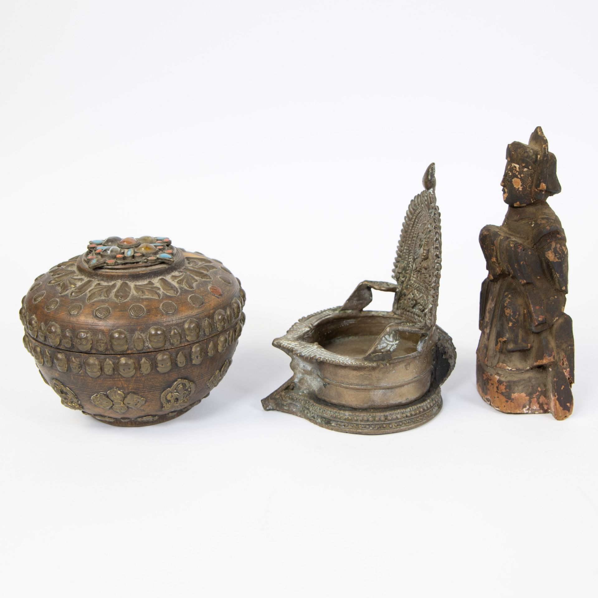 Collection of Tibetan, offering pot inlaid with stones and skulls, bronze oil lamp and wooden Buddha - Image 2 of 5