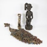 Collection of miscellaneous items, a canoe seat, ancestor statue Sumba and Nias