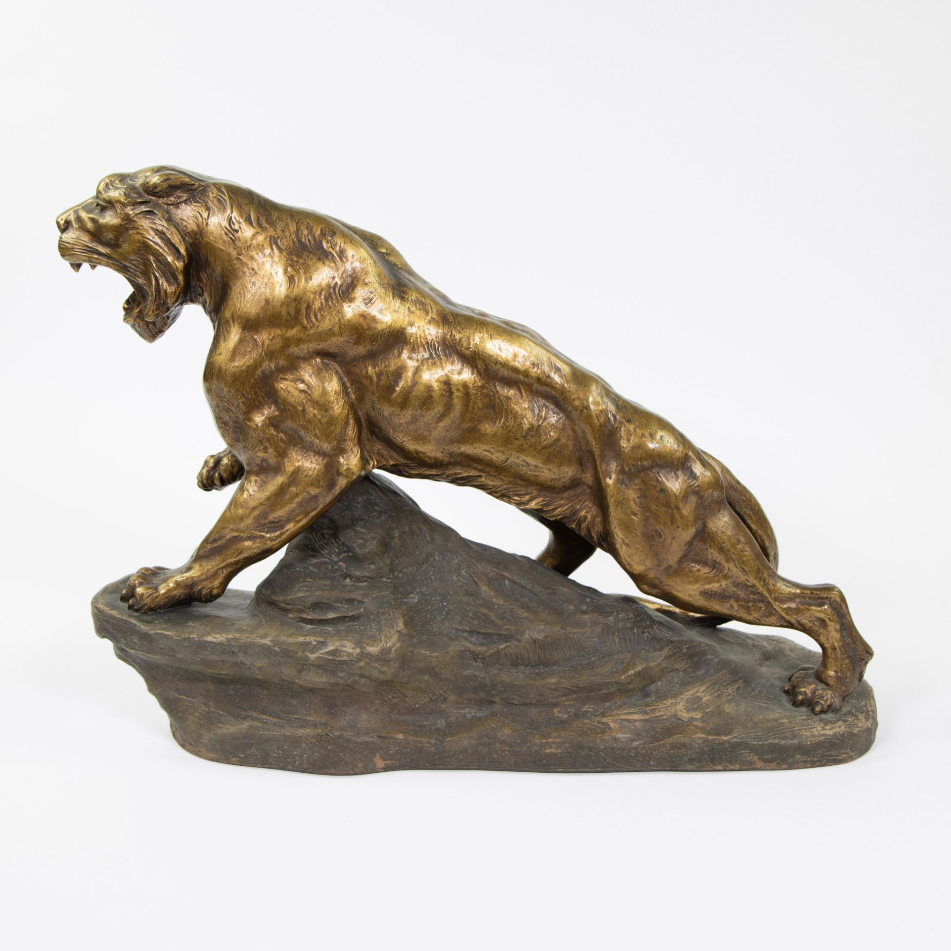 Armand FAGOTTO, gilt patinated terracotta of a panther on a rock, circa 1940, signed. - Image 5 of 5