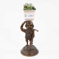 Wood carving plant stand in the shape of a gnome with pickaxe, Black Forest, circa 1930.