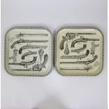 Two beautiful serving trays made of metal, with nice pistol and guns pattern. From the 1960s, unmark