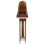 Wooden Art Deco pedestal with marquetry/mother of pearl and a wooden statue of an Indian, signed F.