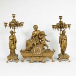 Imposing 19th century matte gold plated mantel clock decor seated woman with amaretto and 2 cariatid