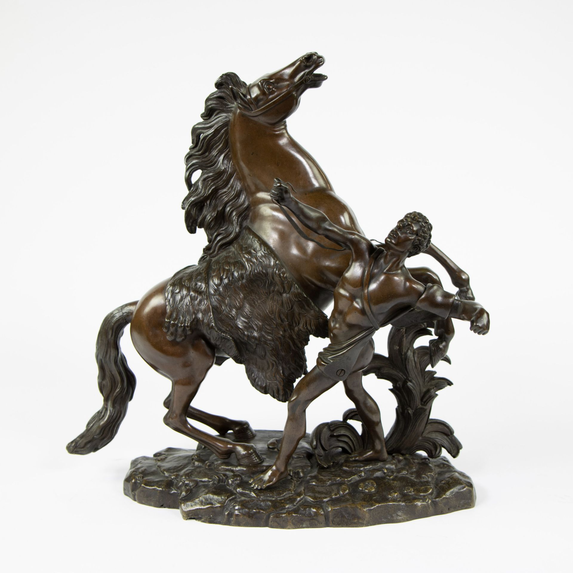 Brown patinated bronze Cheval de Marly, after G. Coustou