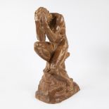 Brown patinated terracotta sculpture, signed O. MERVAL