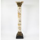 Pedestal with white veined marble column and capital decorated with bronze ornaments.