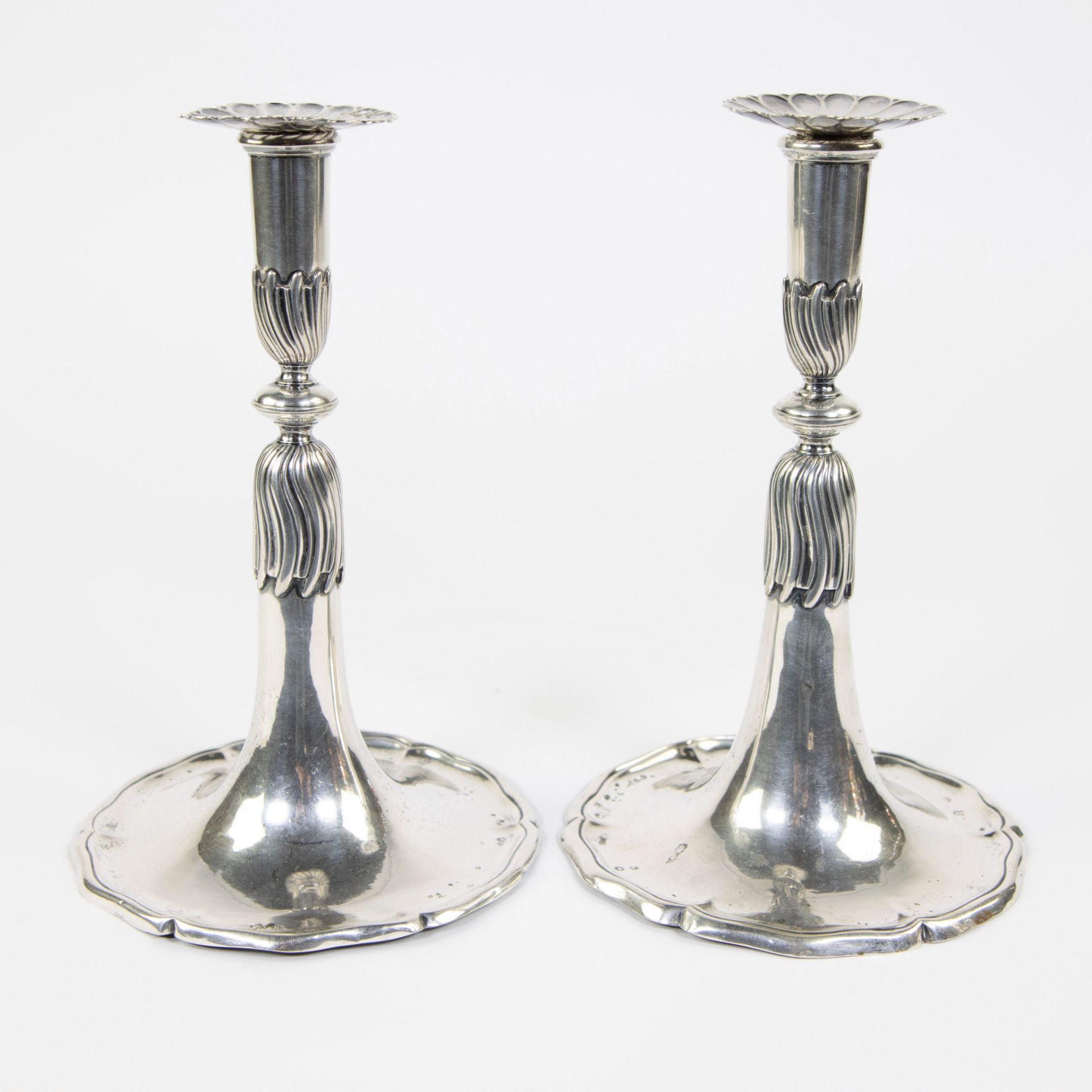 Pair of silver trumpet candlesticks, with hallmarks.