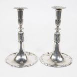 Pair of silver trumpet candlesticks, with hallmarks.