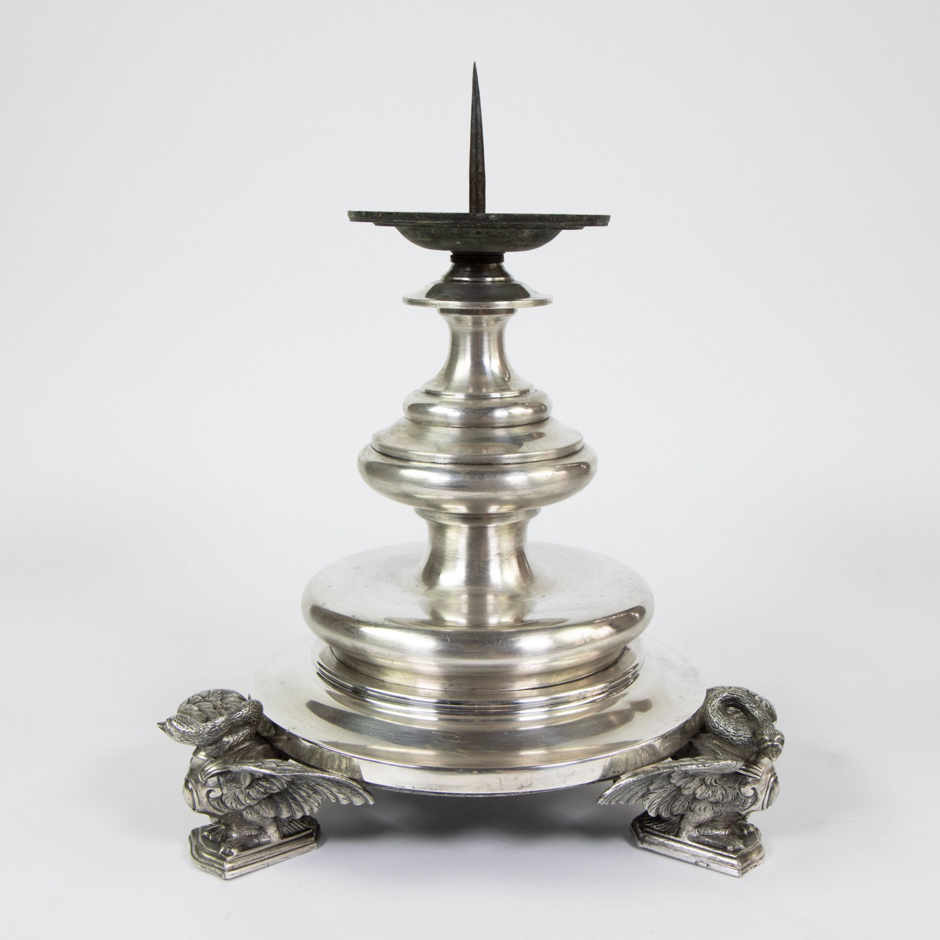 Silver plated candlestick with three swans as legs