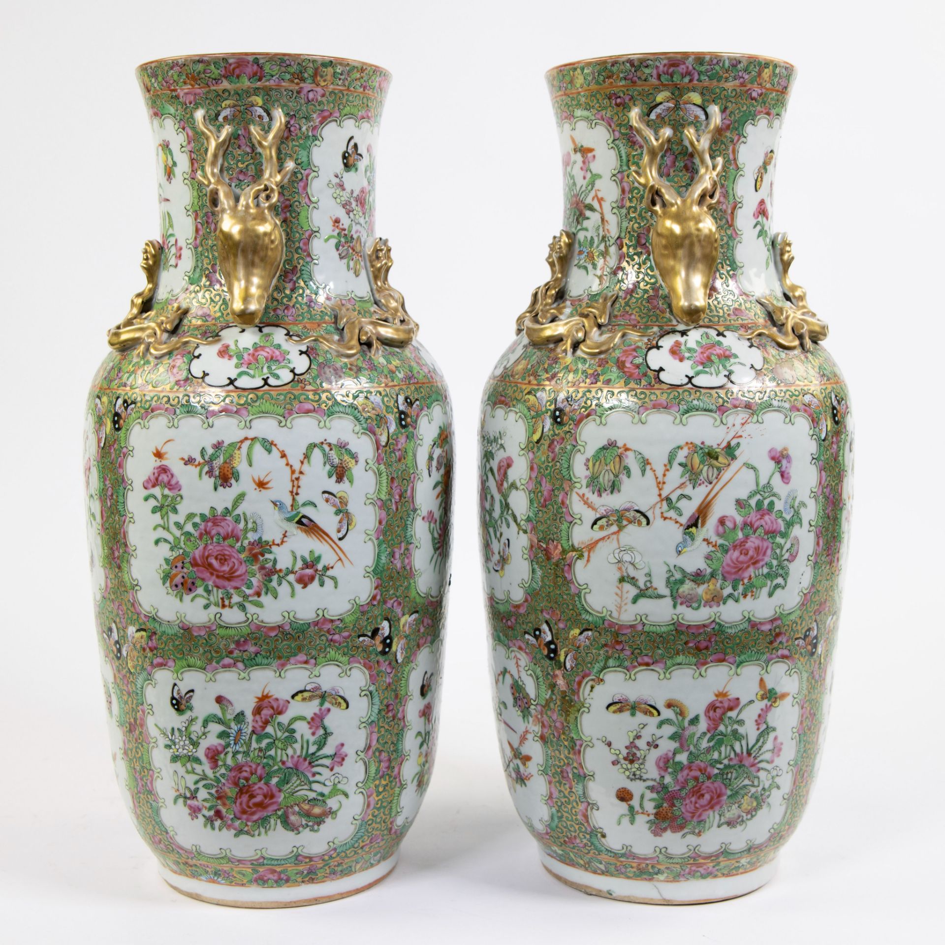 A pair of large Canton porcelain baluster vases, decorated in famille rose enamels with flowers and - Image 2 of 6