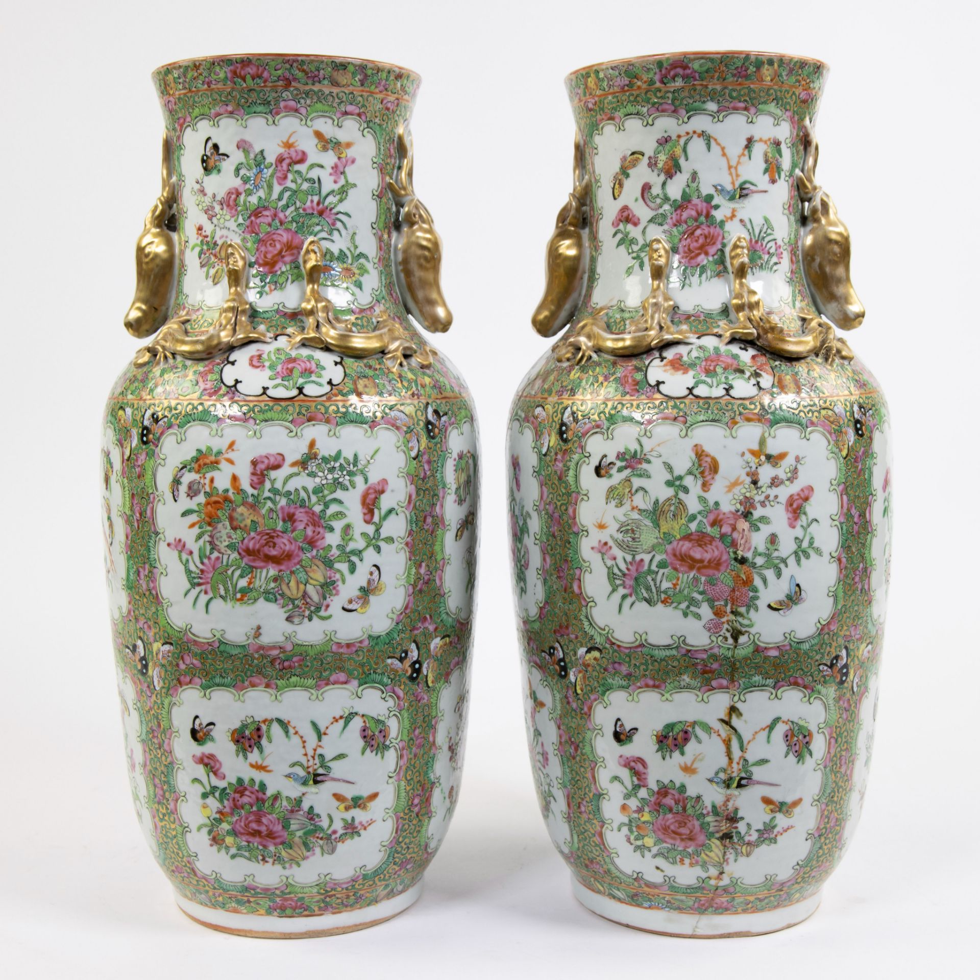 A pair of large Canton porcelain baluster vases, decorated in famille rose enamels with flowers and - Image 3 of 6