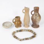 Collection of archaeological stoneware, including drinking bowl Siegburg 15th, jug Raeren 16th, jug